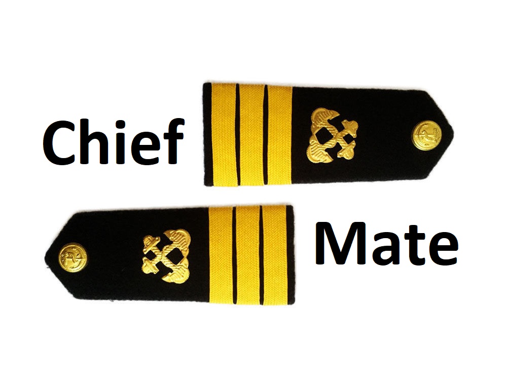 Chief mate's shoulder boards with three golden stripes.