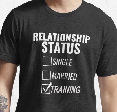 A black t-shirt with the word "Relationship Status" and three boxes, and the last one ticked is "Training".