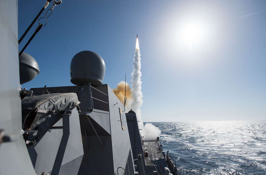 Destroyer USS Stockdale (DDG 106) firing a missile from its deck during a live fire exercise.