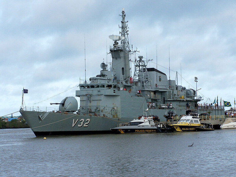 Corvette Warship Julio de Noronha docked in port together with patrol boats.