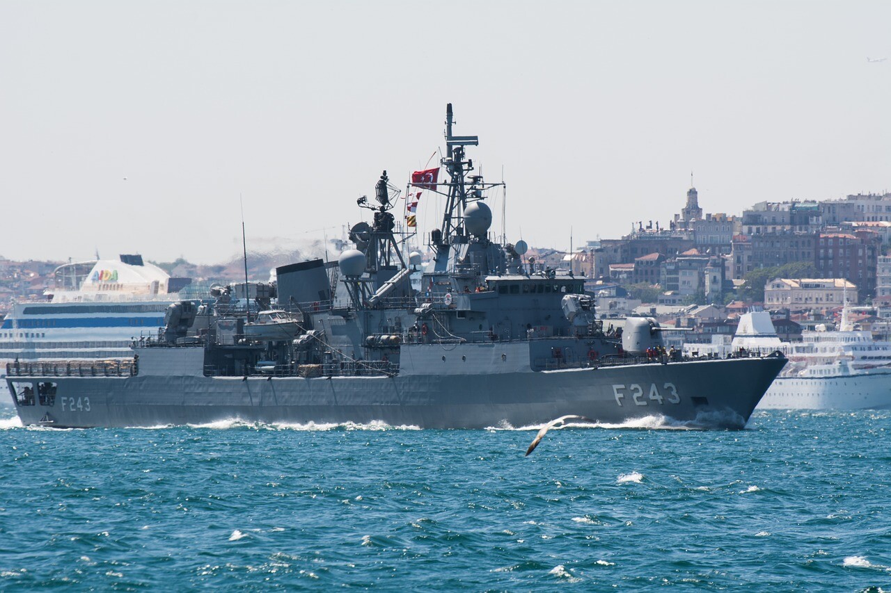 A Turkish Frigate sailing inside the port.