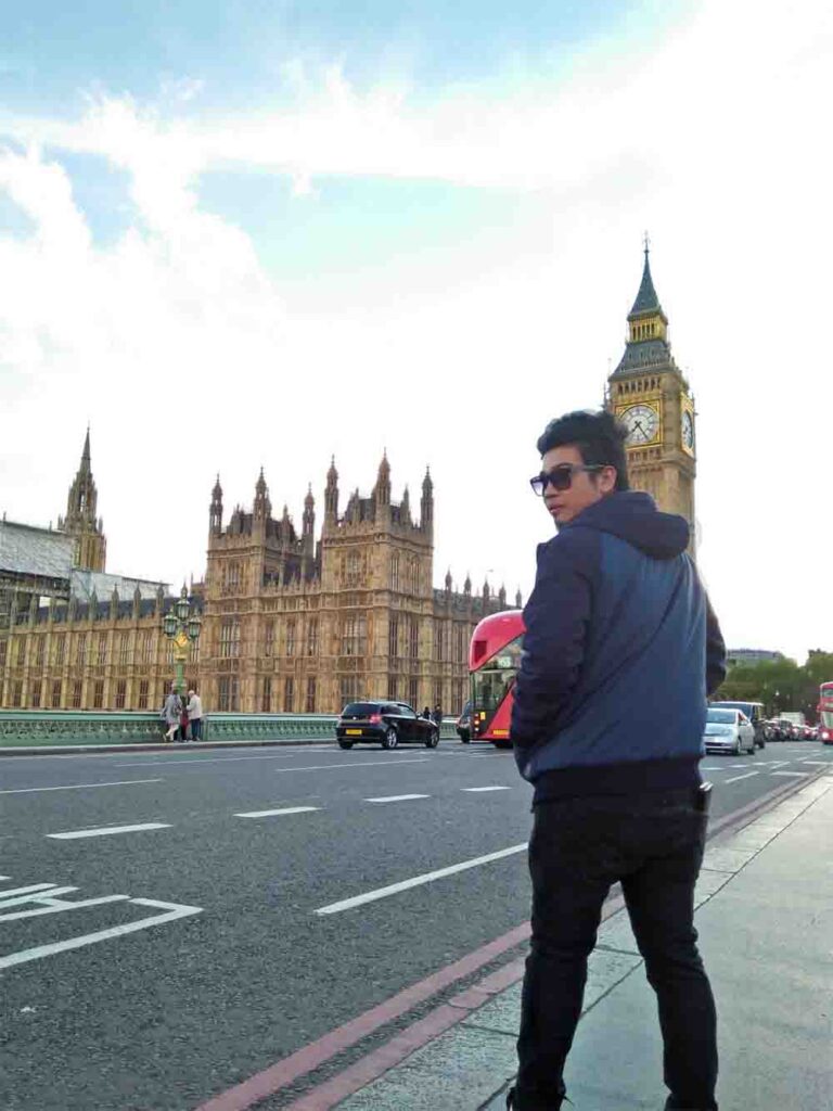 My friend walking along the Westminster Bridge with the Big Ben behind him during one of our shore leave in London.