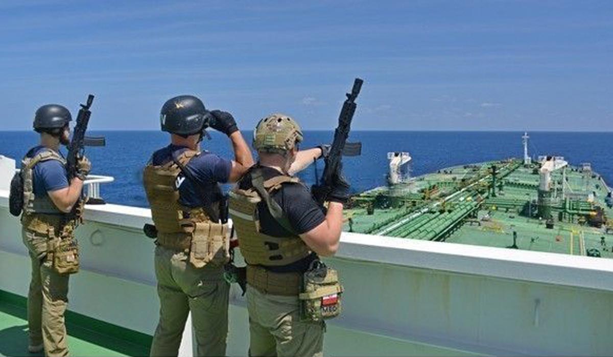 Armed security officers outside the bridge wings of a vessel.