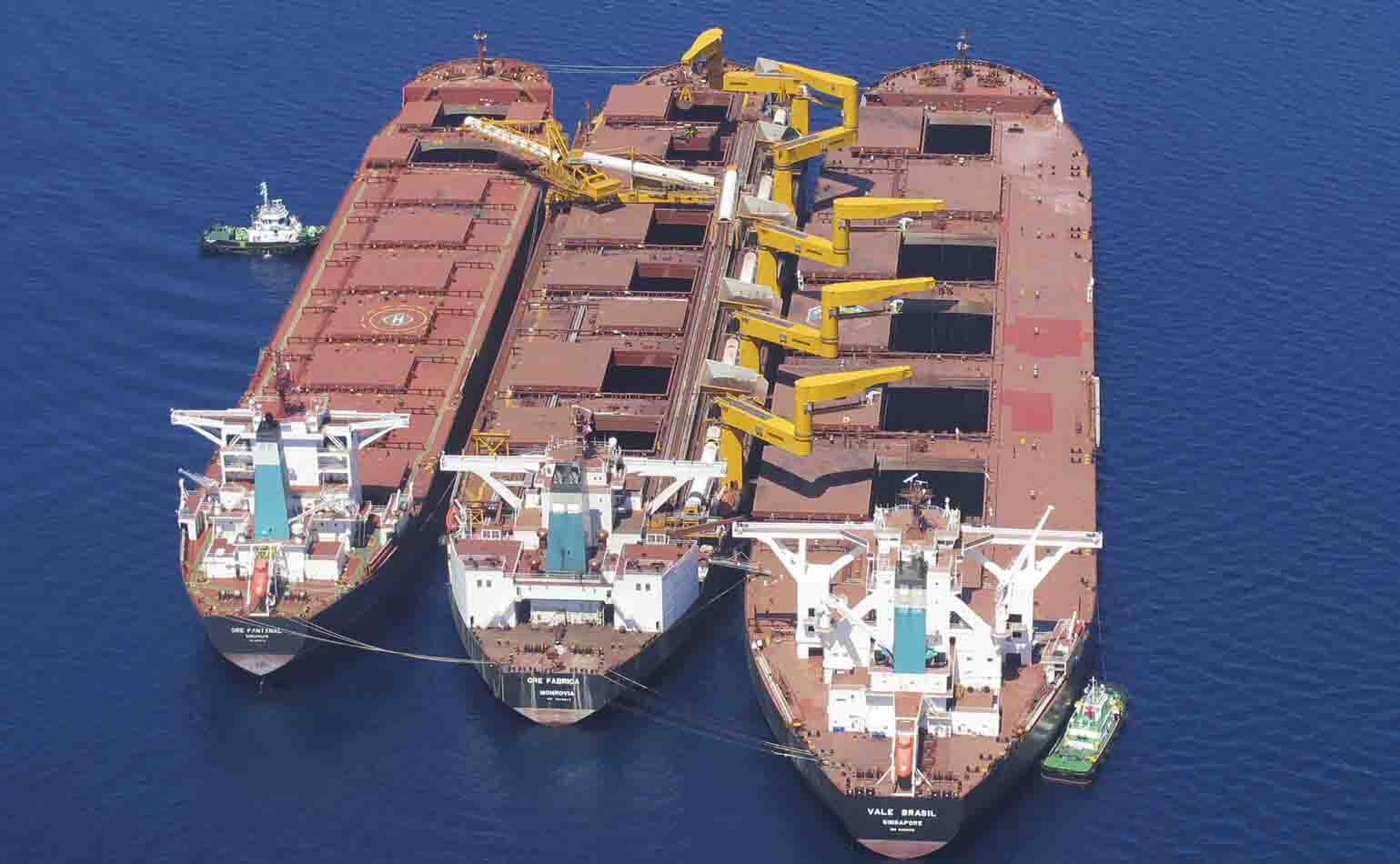 Three bulk carriers on an STS operation.