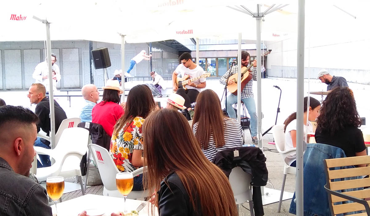 An acoustic band playing on the roof deck of El Corte Ingles mall in La Coruna.