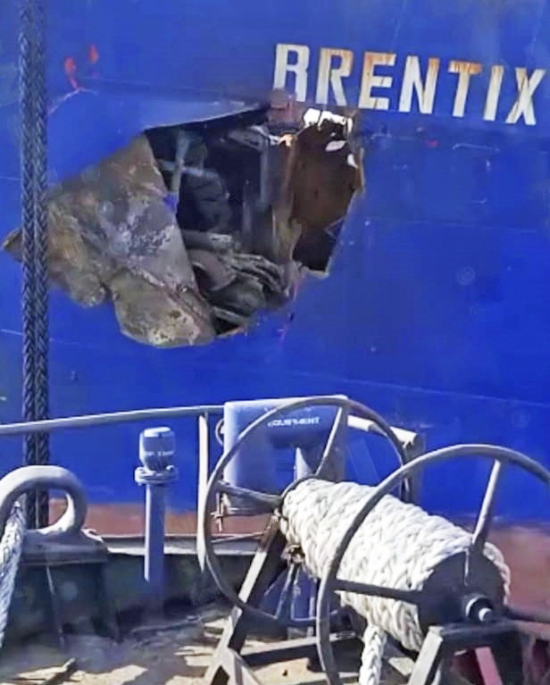 A hole on the bow of the vessel Brentix that was hit by a missile.