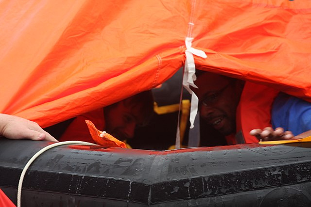 Crew inside the inflatable liferaft.