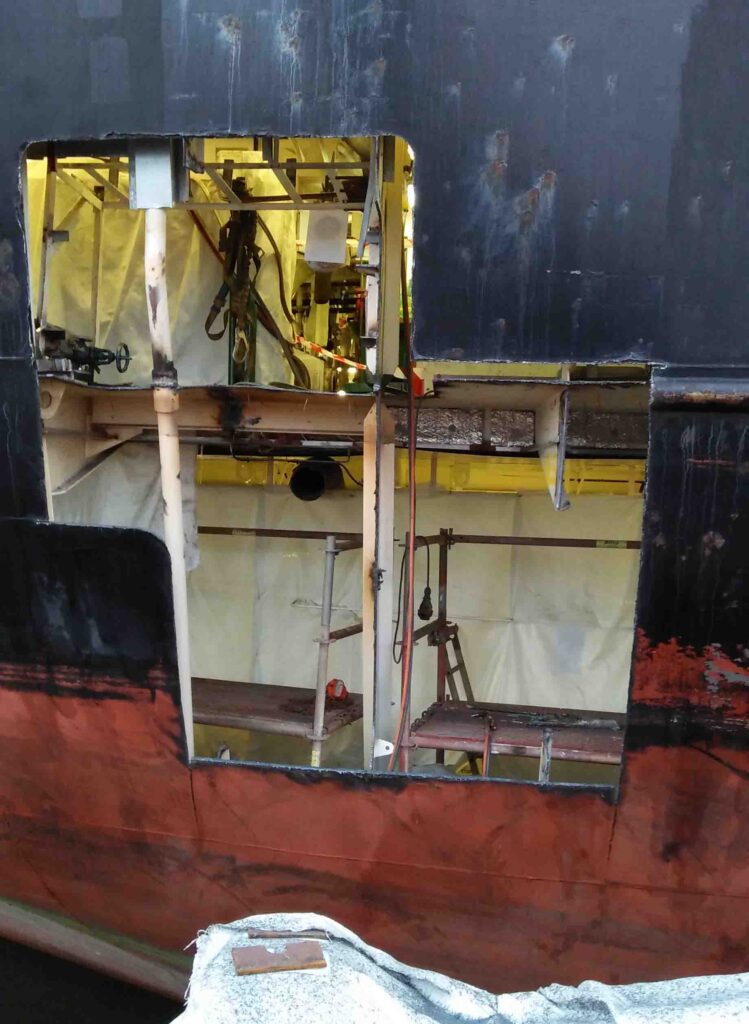 The ship's hull or the side of the ship which is cut open in a shipyard.