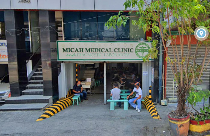Seafarers waiting outside the entrance of Micah Medical in Manila.
