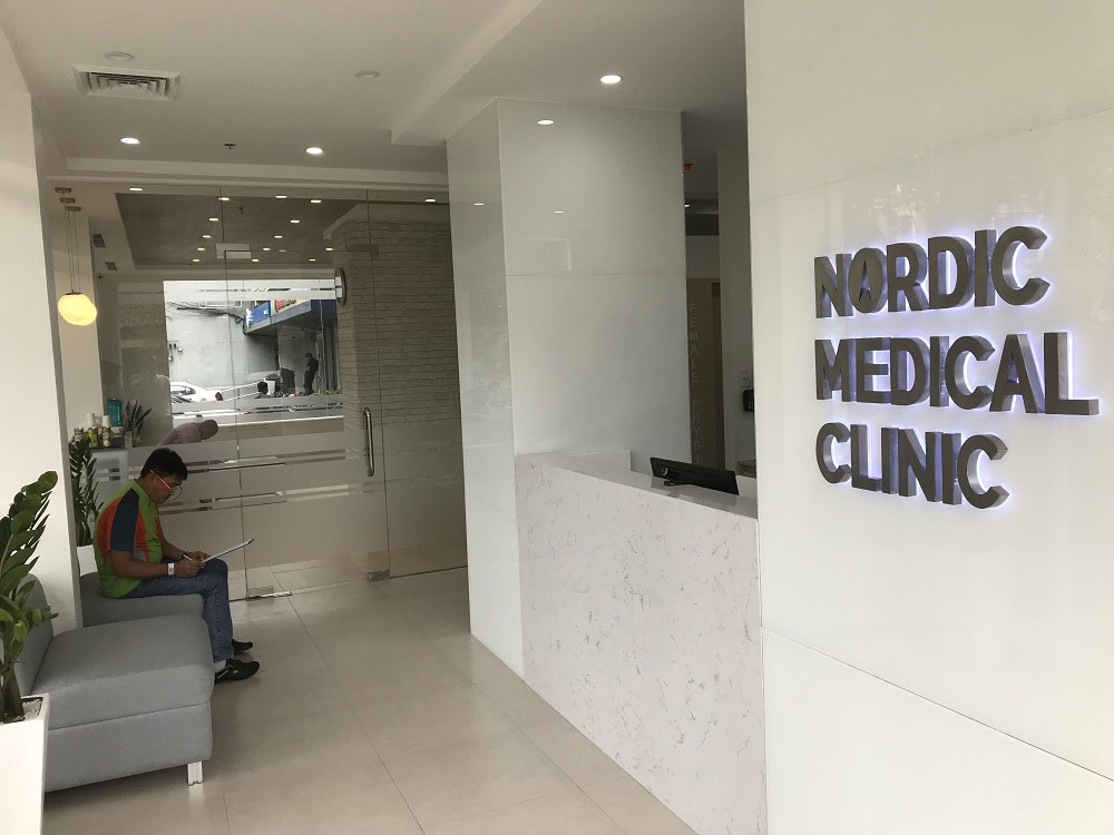 A seafarer sitting in the waiting room inside the Nordic Medical Clinic in Cebu.