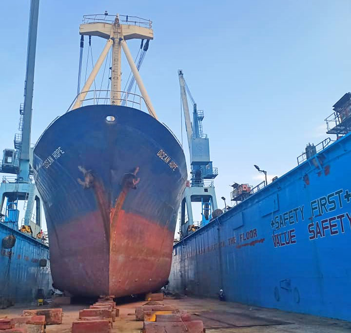 A blue ship in a shipyard in Gensan.