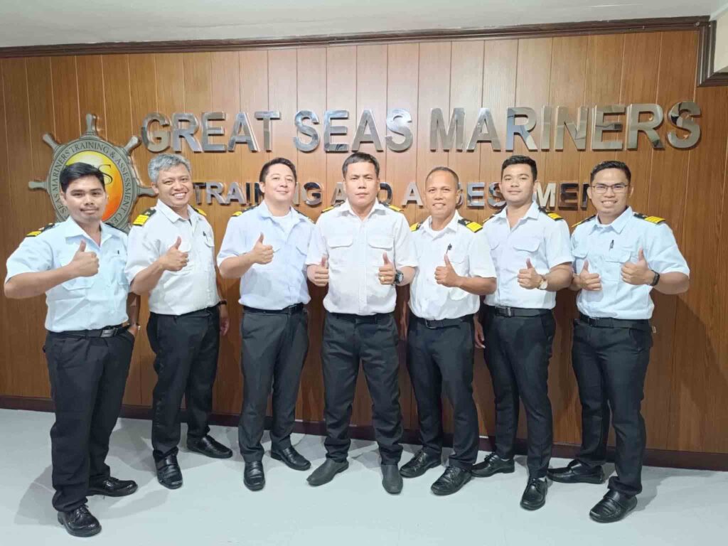 Seafarers with their uniforms on a photo ops in Great Seas Training Center and Assessment.