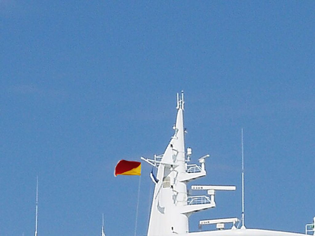 An Oscar Flag raised on the ship's mast.
